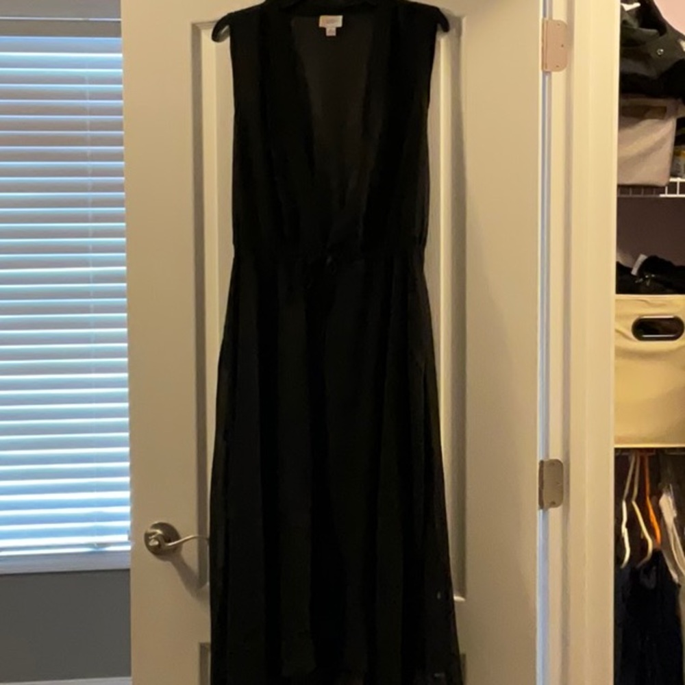 Black Lularoe.  Great for swim over or styled with jeans!